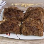 Stuffed beef cutlets: the recipe for breaded slices stuffed with ham and cheese